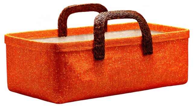 A textured orange fabric basket with dark brown woven handles, isolated on a transparent background