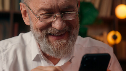 Confident successful old Caucasian man male mature takes off glasses looking at camera folded hands...