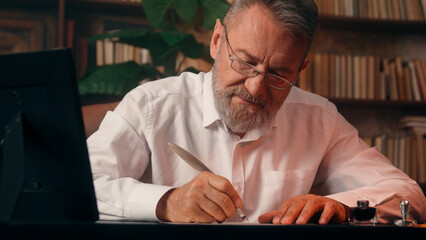 Confident successful old Caucasian man male mature takes off glasses looking at camera folded hands...