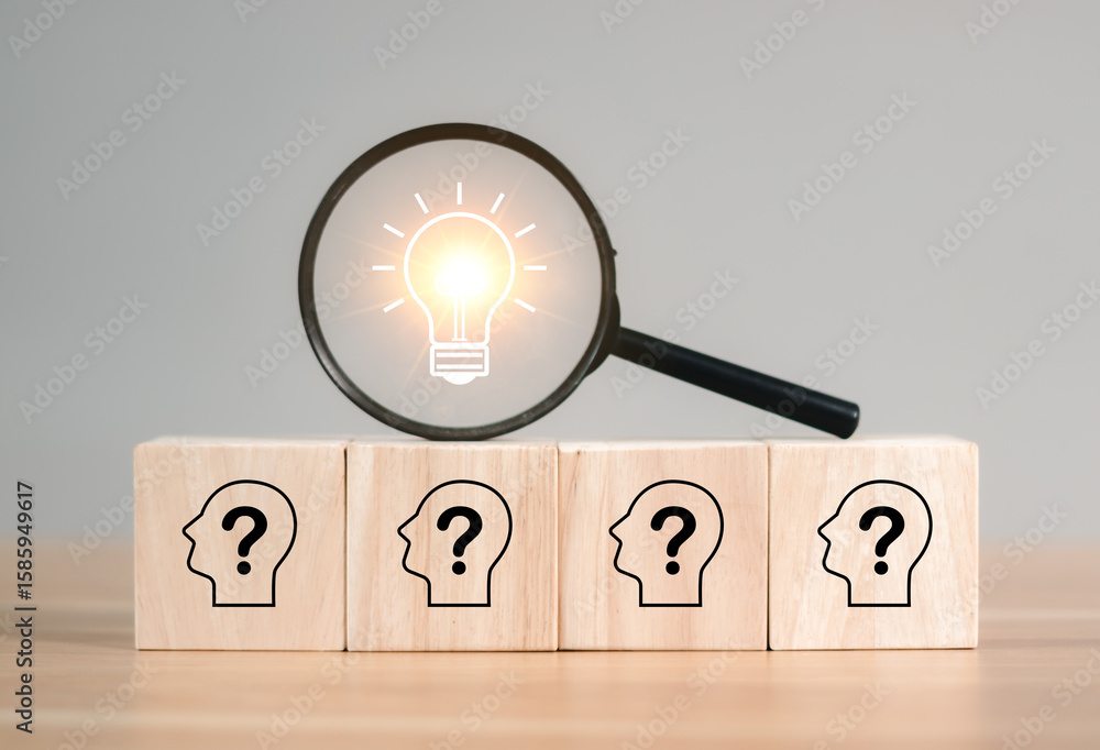 Poster innovation and problem solving concept. magnifying glass focuses on light bulb icon above wooden blo