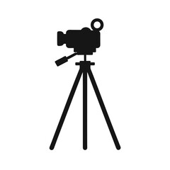 Silhouette of camera mounted on tripod with white background for photography theme  