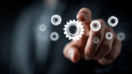 Hand interacting with digital gears on a dark blurred background view