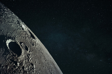 Close-up view of the Moon's surface with deep craters and rugged terrain, set against a starry night sky. Concept of space exploration, astronomy, and the cosmos.