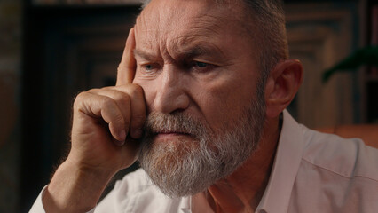 Confident successful old Caucasian man male mature takes off glasses looking at camera folded hands...