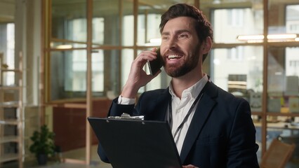Business man worker talking mobile phone in office Caucasian businessman manager negotiate bank...