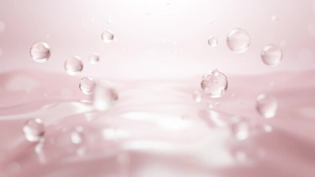 Hydration motion with floating cosmetic drops. Skincare glow, smooth liquid, and elegant design in a seamless background. Molecular beauty in soft pink tone.