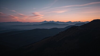 Obraz premium Layers of mountain ranges at sunrise.