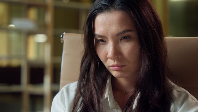 Asian woman business worker in office thoughtful businesswoman brainstorm think Japanese Chinese Korean girl manager designer architect female planning engineering project working laptop think doubt