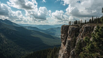 Rocky mountain peak overlooking a valley.