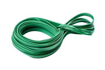 Green rubber bands coiled and intertwined on black background