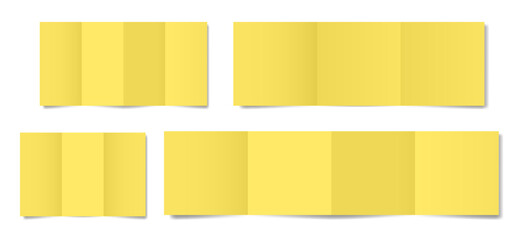 Set of yellow folded paper sheets. Double gate fold. Vertical pages. Blank booklet. Four panel accordion fold