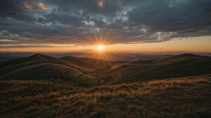 Golden sunset over rolling hills.