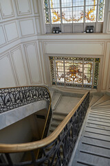 Contemporary White Marble Staircase with Colorful Glass Accent