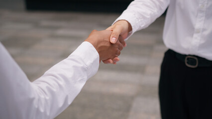 Close up business partners hands handshake businesspeople deal successful agreement cooperation...