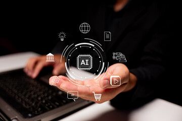 A hand hovers over a keyboard, displaying a digital AI icon surrounded by technology and...