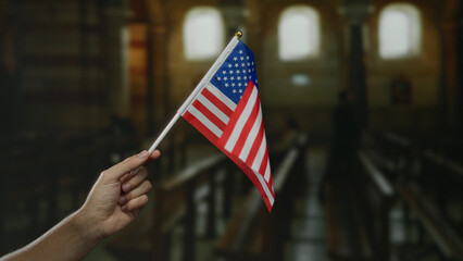 Caucasian man holding an american flag inside a church, symbolizing patriotism and faith in a...