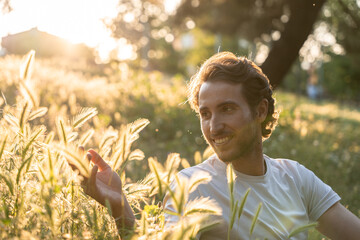 Man enjoying a peaceful moment at sunset in nature