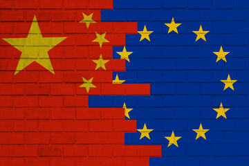 Europe Union and China flags painted on the brick wall. Trade, tariffs war and competition. Trade,...