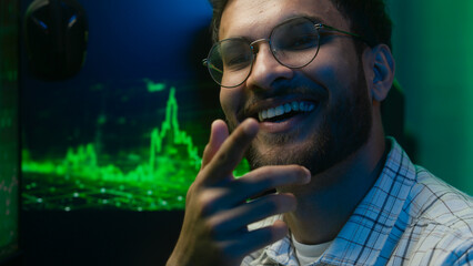 Thoughtful pensive Arabian Indian man thinking pondering solution programmer coder hacker worker...