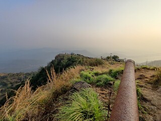 Mesmerizing landscape distant view of hills under the evening sky