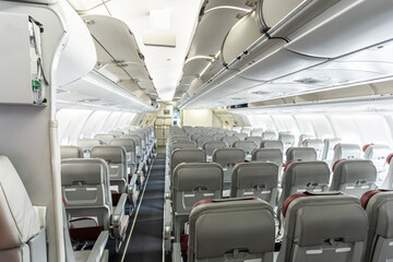 Inside empty wide body passenger aircraft cabin