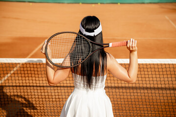 People are engaged in a sports game, big tennis 