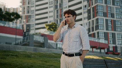Angry Caucasian man talking mobile phone smartphone screaming conflict boss employee male guy...