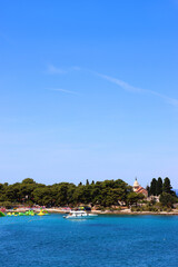 Beach and picturesque cemetery in Supetar, on island Brac, Croatia.