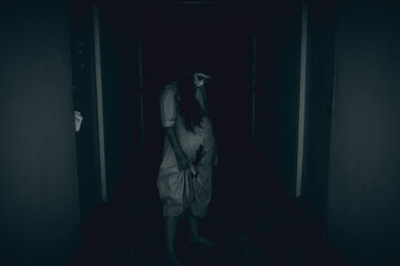 Portrait of asian woman make up pregnant ghost.,Scary horror scene for background,Halloween...
