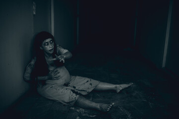 Portrait of asian woman make up pregnant ghost.,Scary horror scene for background,Halloween...