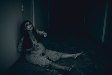 Portrait of asian woman make up pregnant ghost.,Scary horror scene for background,Halloween...
