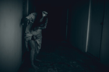 Portrait of asian woman make up pregnant ghost.,Scary horror scene for background,Halloween...