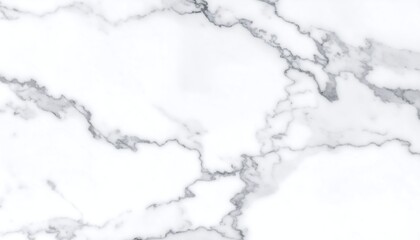 Close-up view of a white marble surface with subtle gray veins