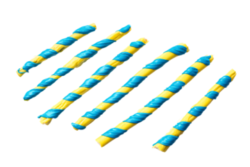 a group of blue and yellow toothbrushes on a white surface
