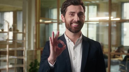 Caucasian businessman smiling in office showing ok sign business man portrait happy middle-aged male employer guy okay hand gesture satisfied entrepreneur at workplace success approve good recommend - Powered by Adobe