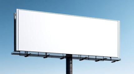 Obraz premium Large blank billboard sign on a tall pole with blue sky background for advertising.