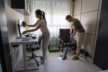 Modern couple sharing household chores collaboratively