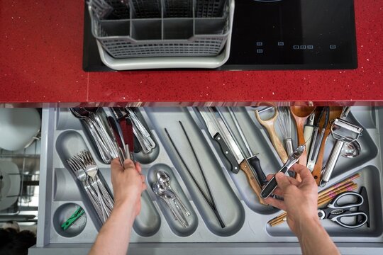 Organizing kitchen utensils in a drawer