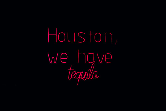 Neon text art with humorous tequila message