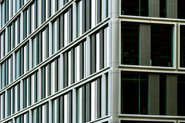 Contemporary Office Building Exterior with Glass and Concrete Elements in Minimalist Design