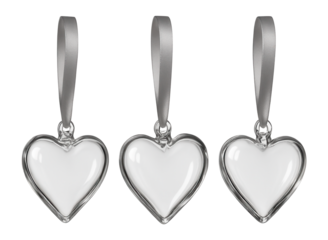 Glass heart ornaments with ribbon loops for decorating indoor plants in a modern loft.