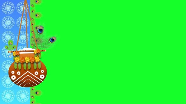 Janmashtami decorative dahi handi on green screen with lord Krishna's flute and peacock feathers.