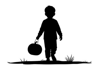 Child silhouette holding a pumpkin while walking on grass at Halloween  