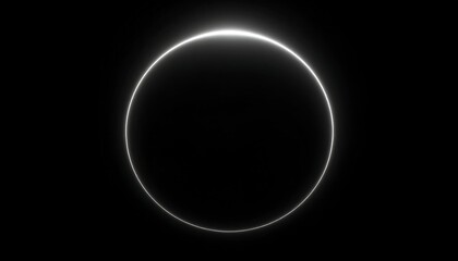 Circular luminous ring against black backdrop