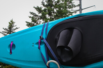 close-up of a kayak strapped to a vehicle's roof rack. sports and recreation design element tor background