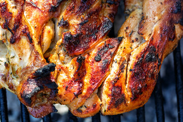 Pork chops, steak, sausages on barbecue grill
