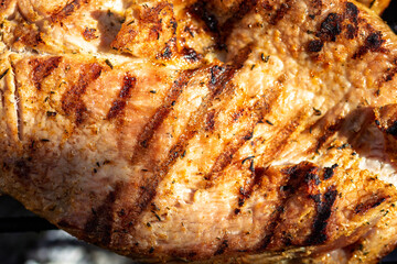 Pork chops, steak, sausages on barbecue grill