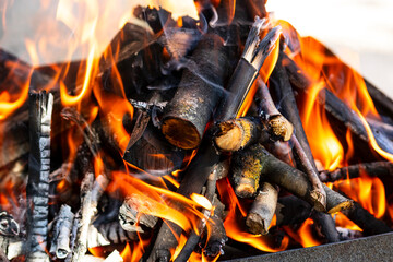 Burning wood and fire flames. Empty hot charcoal barbecue grill with bright flame