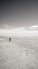Midday beach stroll under a clear sky at summer vacation spot Generative AI