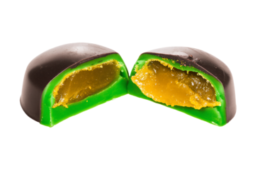 a chocolate covered in green and yellow candy